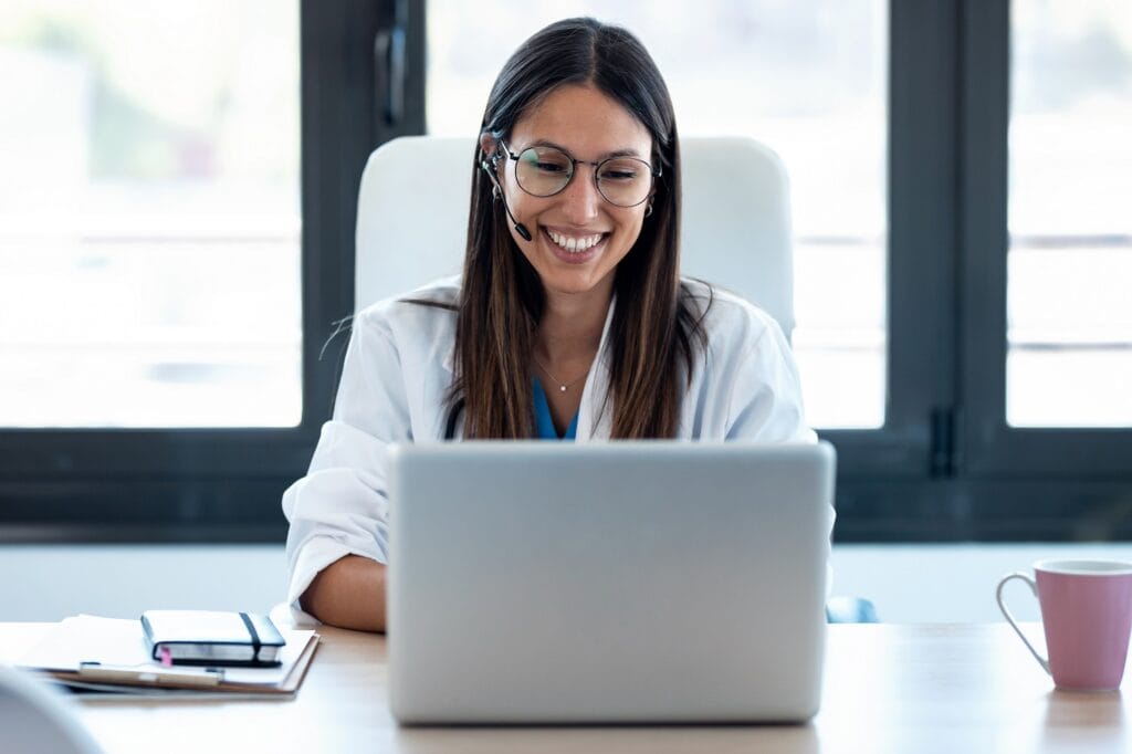 Female doctor talking with colleagues through a video call | TMZ Behavioral Care in Davie, FL