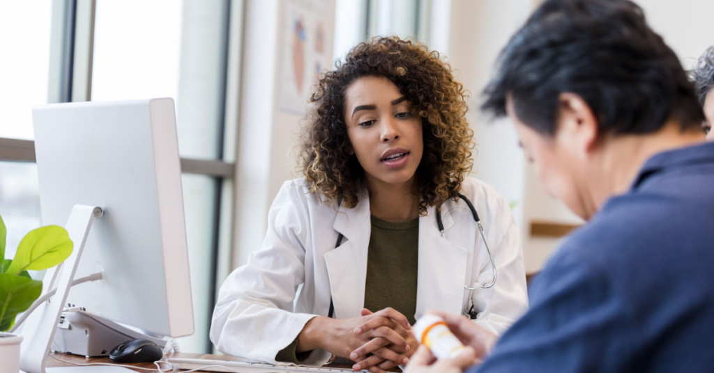 Psychiatric provider at TMZ Behavioral Care in Davie, Florida discussing personalized medication management with a patient during a consultation.